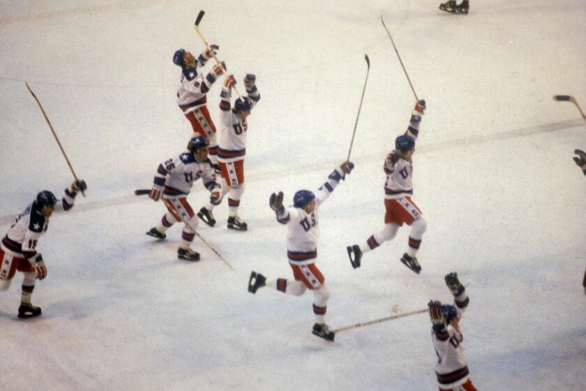 The 1980 "Miracle on Ice" hockey game is among many unforgettable memories stored away by Helene Elliott, who is covering her 15th Olympics.