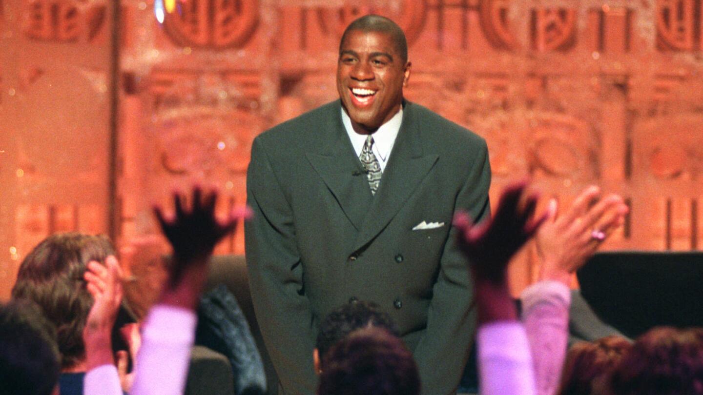 Magic Johnson greets his audience at the opening of his talk show, "The Magic Hour" during a taping in Los Angeles on June 8, 1998.