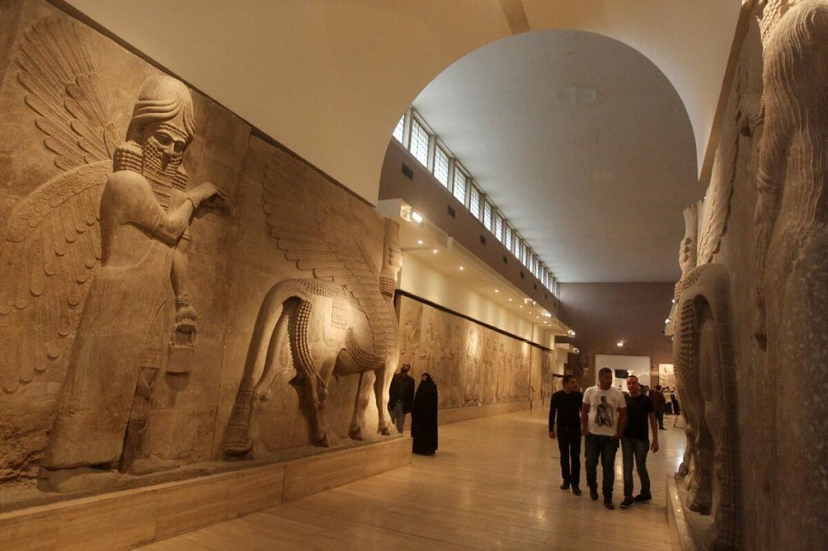 Baghdad's shuttered National Museum of Iraq was re-opened in direct rebuke to the recent destruction of antiquities by the Islamic State.
