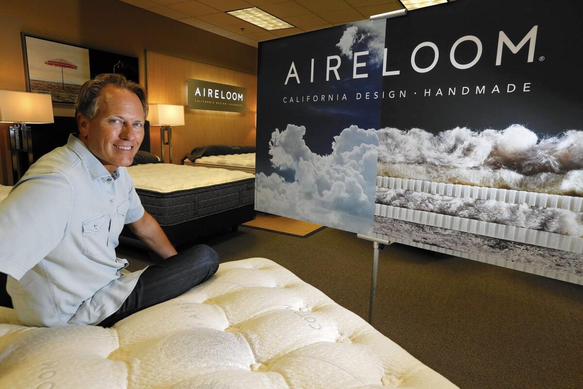 David Long, E.S. Kluft’s marketing director and self-described “mattress geek,” at what he calls “probably the most inefficient factory in the United States.” The company encourages its workers to slow down.