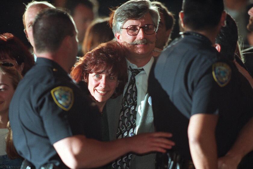 Fred Goldman and his wife Patti leave the courthouse in Santa Monica after the jury found O.J. Simpson guilty in the civil trial involving the murder of Goldman's son Ron. Mandatory Credit: Gina Ferazzi/The LA Times