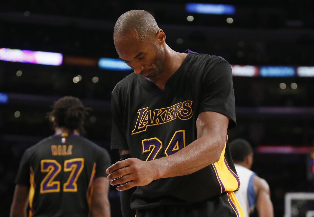 Lakers shooting guard Kobe Bryant reacts during a game against the Timberwolves earlier this year.