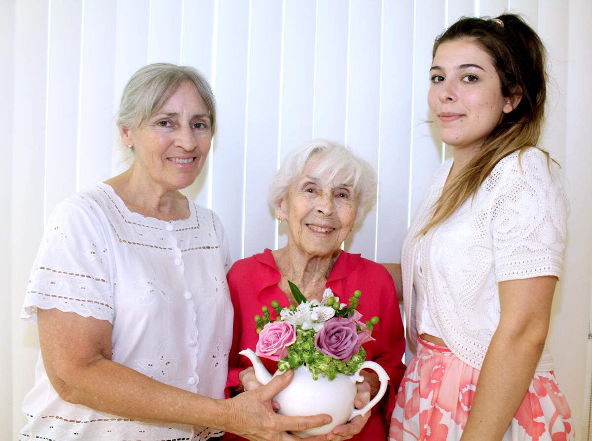Introduced at the Friendship Tea of the Cabrini Literary Guild were member 99-year-old Mary Nelson, her daughter, Edie Hull, and granddaughter, Lenore Nelson.