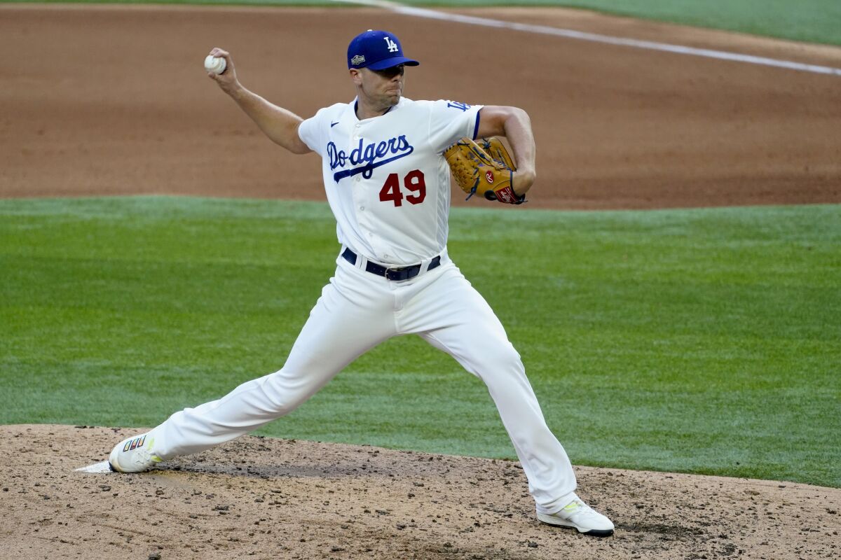 Dodgers relief pitcher Blake Treinen throws during the seventh inning.