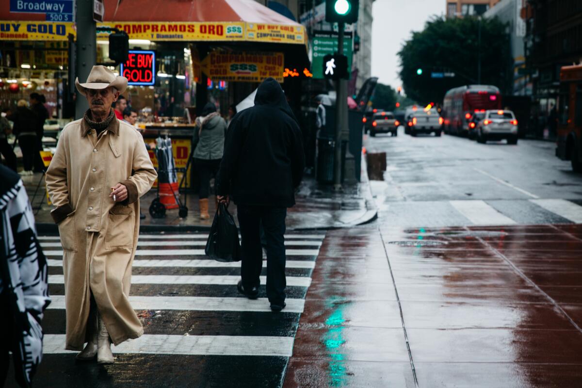 Micah in the crosswalk at 6th and Broadway