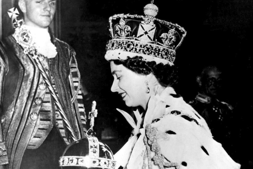 Queen Elizabeth II leaving Westminster Abbey, London, at the end of her coronation ceremony on June 2, 19