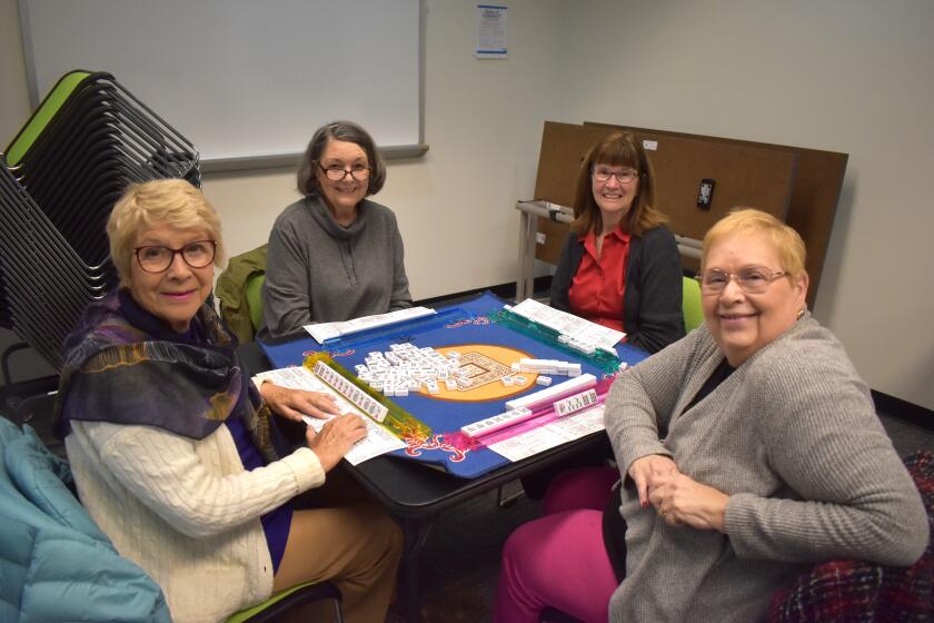 Janniq Tippo, Barbara Brink, Corinne Allan and Marcie Yellin are among those playing mahjong at the RB Library.