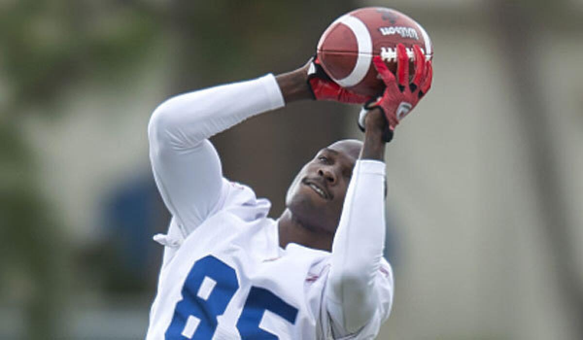 Former NFL wide receiver Chad Johnson pulls down a pass during minicamp practice with the Canadian Football League's Montreal Alouettes in Vero Beach, Fla., on Tuesday.