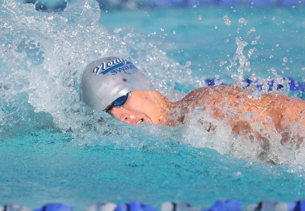 Conner Ohl of Newport Harbor swims the boys 100-yard freestyle to victory on Tuesday.