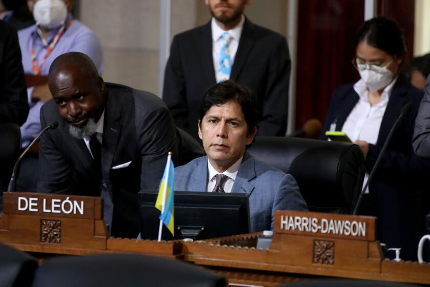LOS ANGELES, CA - OCTOBER 11: Councilmember District 14 - Kevin de Leon, at the Los Angeles City Council meeting at Los Angeles City Hall on Tuesday, Oct. 11, 2022 in Los Angeles, CA. Protestors want the resignation of Los Angeles Councilmembers Nury Martinez, Kevin de Leon and Gil Cedillo. Martinez made racist remarks about Councilmember Mike Bonin son in the recording as her colleagues, Councilmembers Kevin de Leon and Gill Cedillo, laughed and made wisecracks. (Gary Coronado / Los Angeles Times)