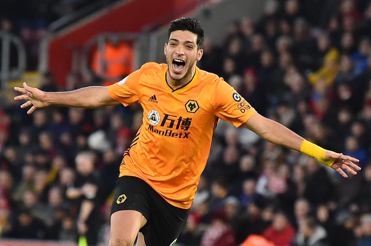 Wolverhampton Wanderers' Mexican striker Raul Jimenez celebrates after he scores the team's third goal during the English Premier League football match between Southampton and Wolverhampton Wanderers at St Mary's Stadium in Southampton, southern England on January 18, 2020. (Photo by Glyn KIRK / AFP) / RESTRICTED TO EDITORIAL USE. No use with unauthorized audio, video, data, fixture lists, club/league logos or 'live' services. Online in-match use limited to 120 images. An additional 40 images may be used in extra time. No video emulation. Social media in-match use limited to 120 images. An additional 40 images may be used in extra time. No use in betting publications, games or single club/league/player publications. / (Photo by GLYN KIRK/AFP via Getty Images) ** OUTS - ELSENT, FPG, CM - OUTS * NM, PH, VA if sourced by CT, LA or MoD **