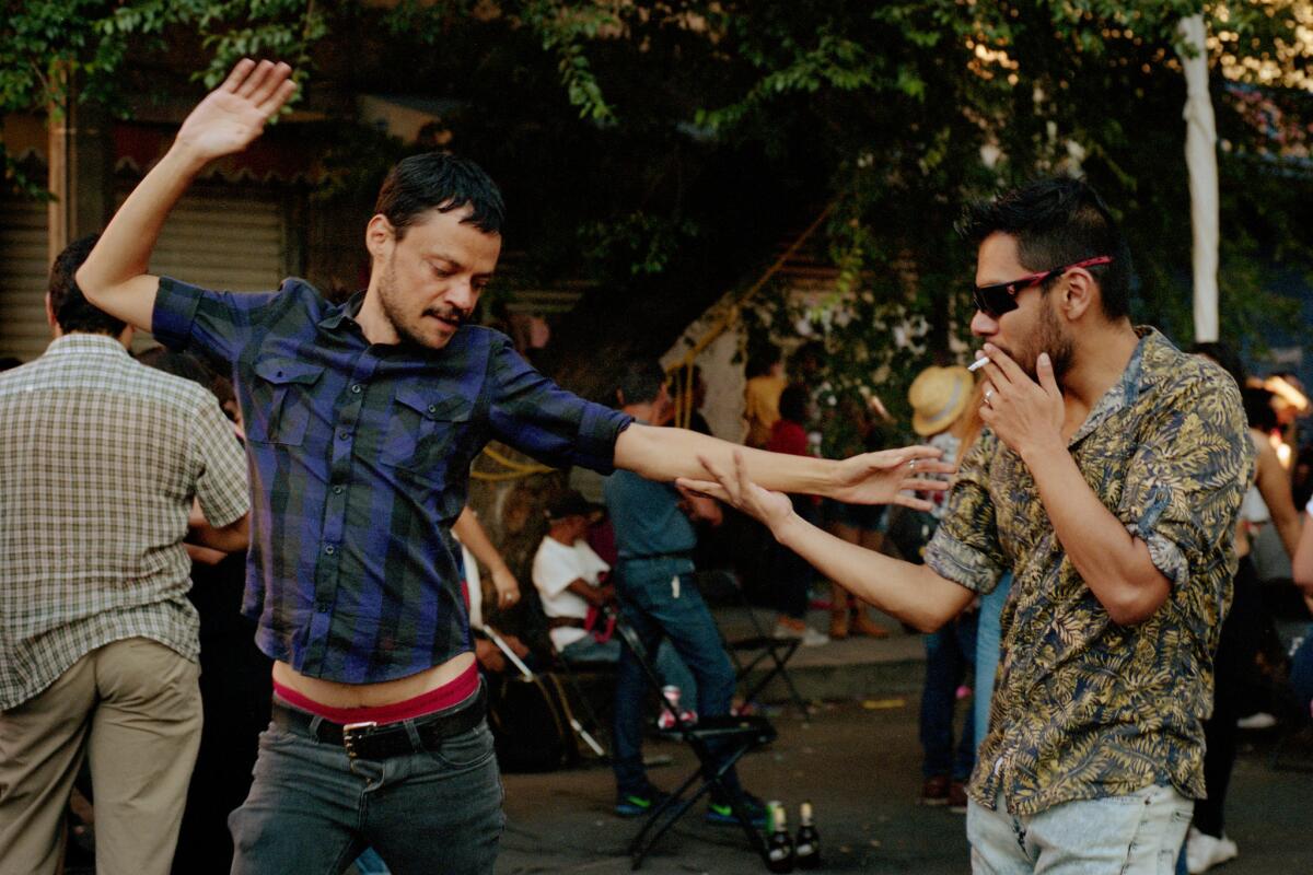 People dance at Caita Fest in Mexico City.