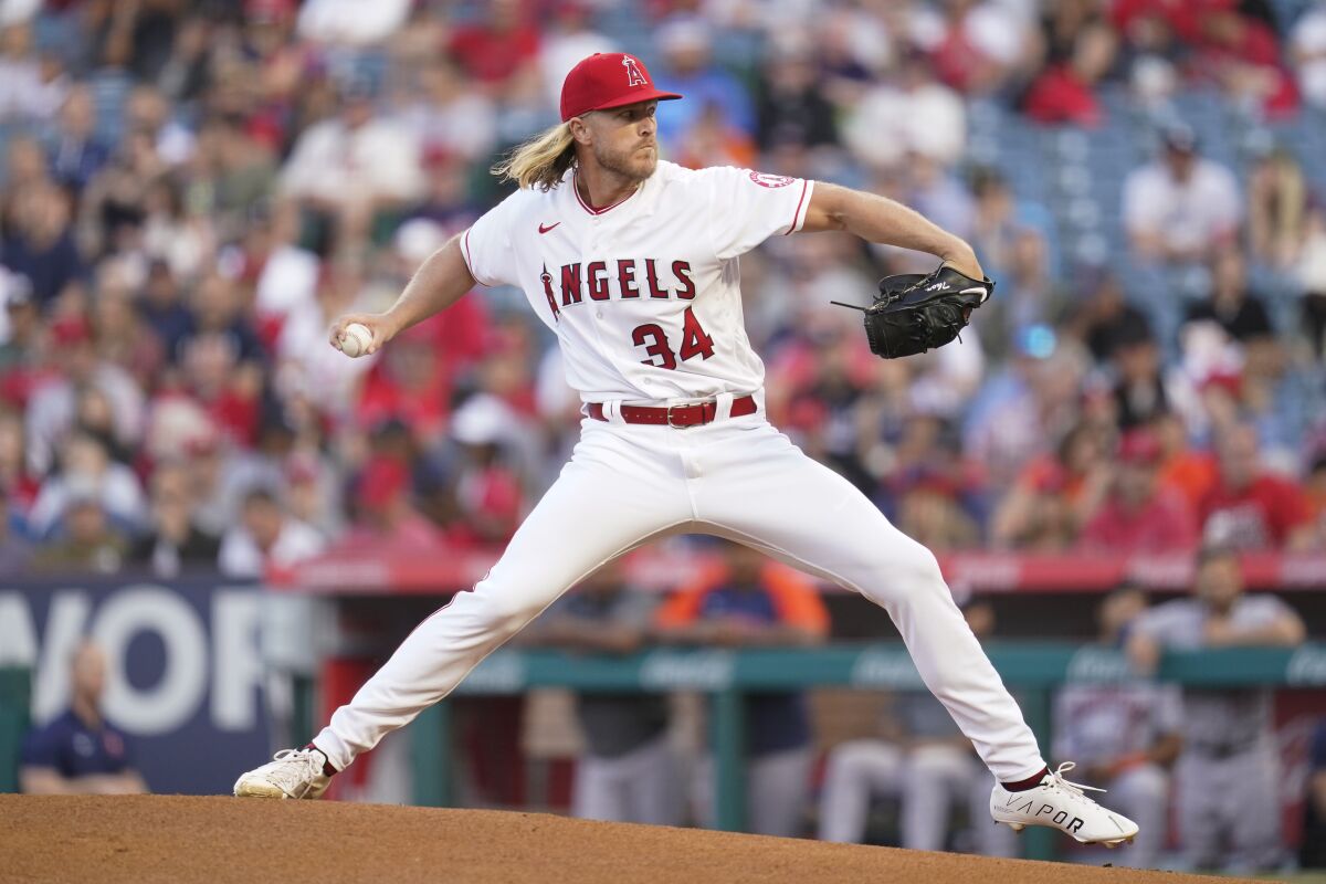 Angels pitcher Noah Syndergaard throws during the first inning against the Houston Astros.