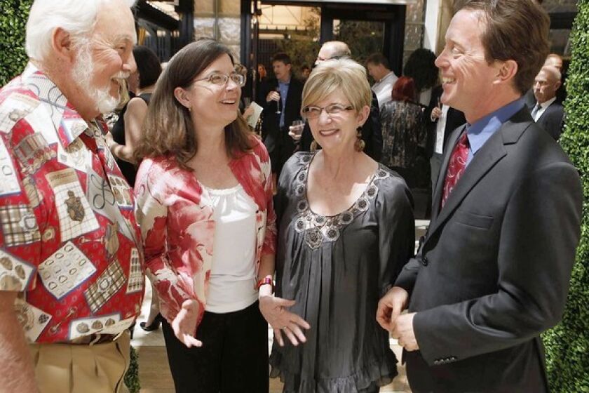 Richard Cramer, left, and Mary Harward with Orange County Performing Arts Center's Judith Morr and Terry Dwyer.