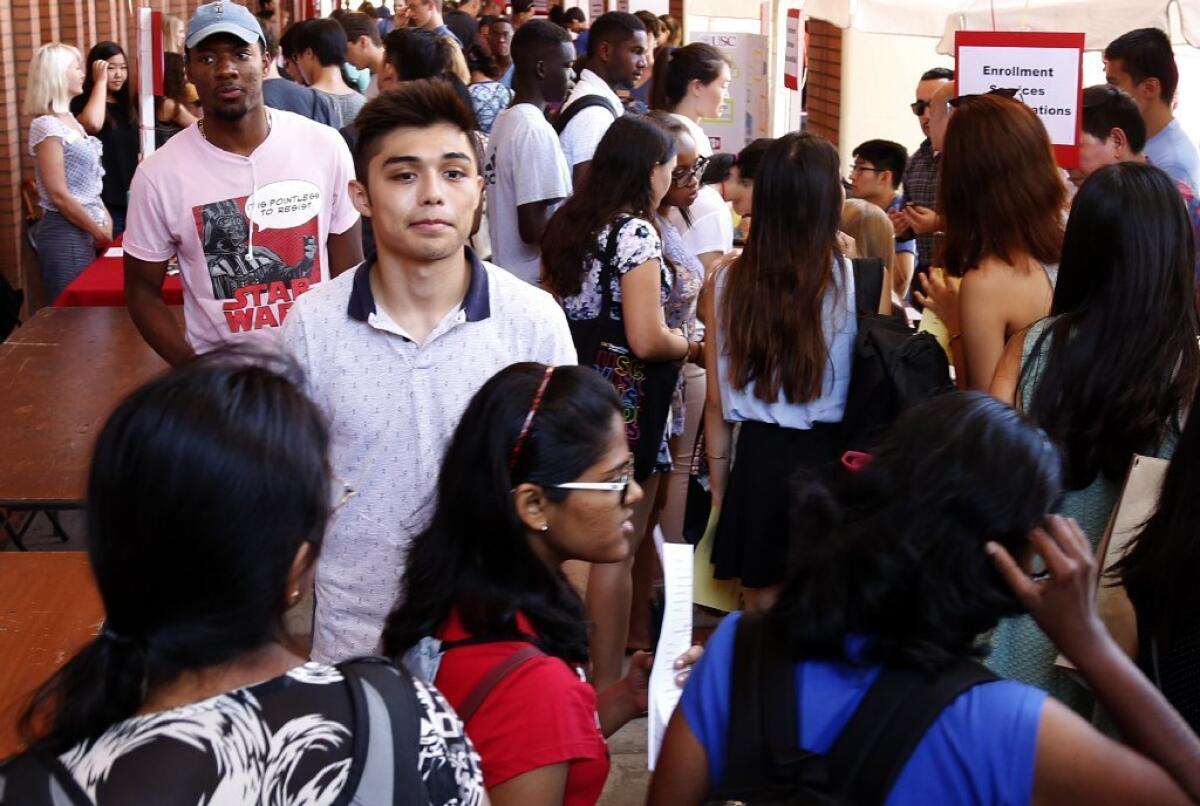 USC freshman Isaac Lemus attends a work study job fair on campus during welcome week.