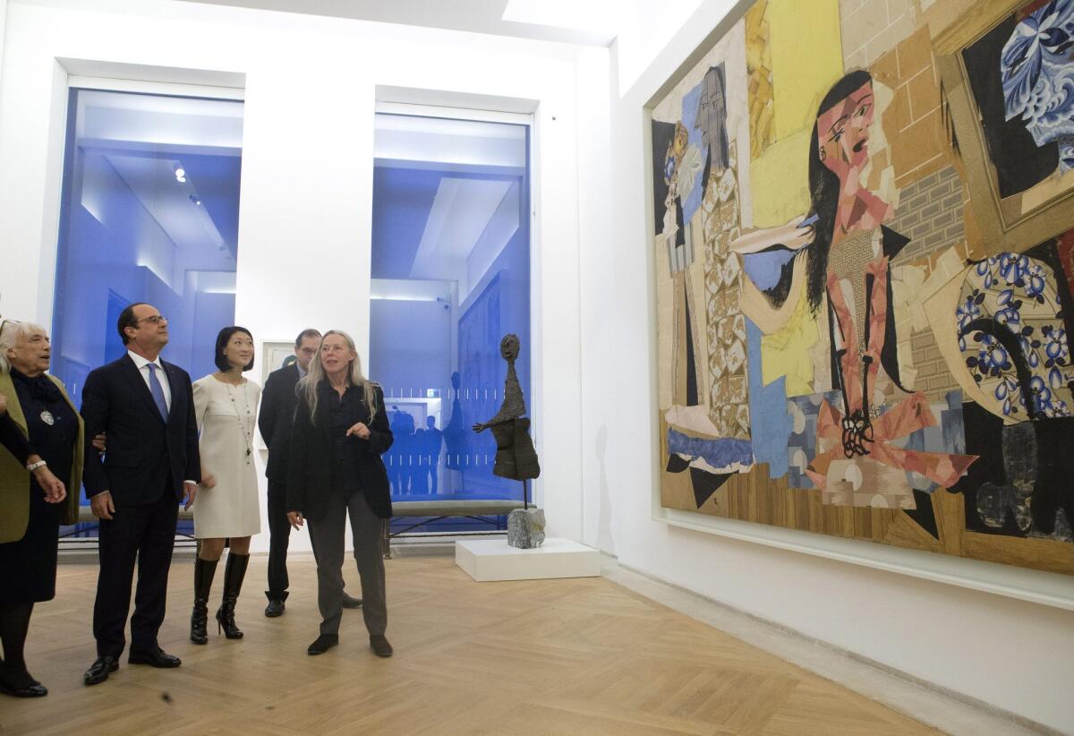 Visitors to the newly reopened Musee Picasso Paris on Oct. 25 included Maya Picasso, left, French President Francois Hollande, French Culture Minister Fleur Pellerin and the chief curator Anne Baldassari.