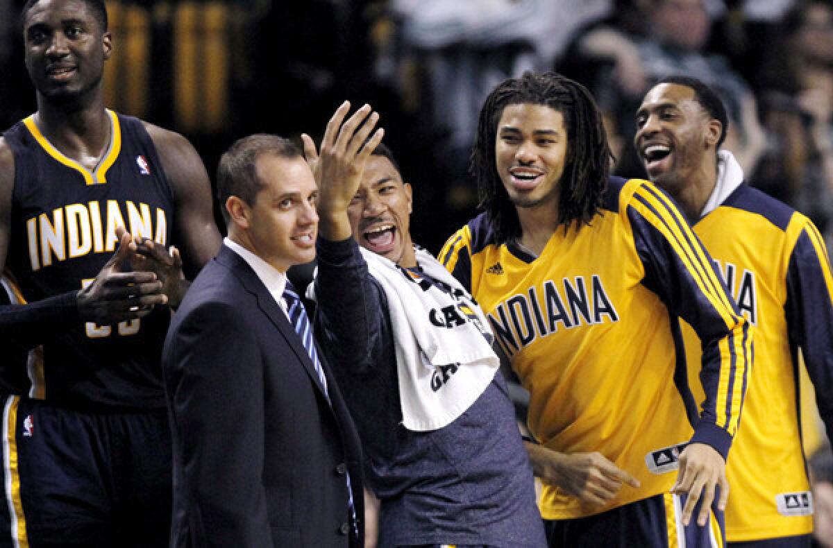 Indiana Pacers Coach Frank Vogel and players celebrate during a victory over the Boston Celtics last week.