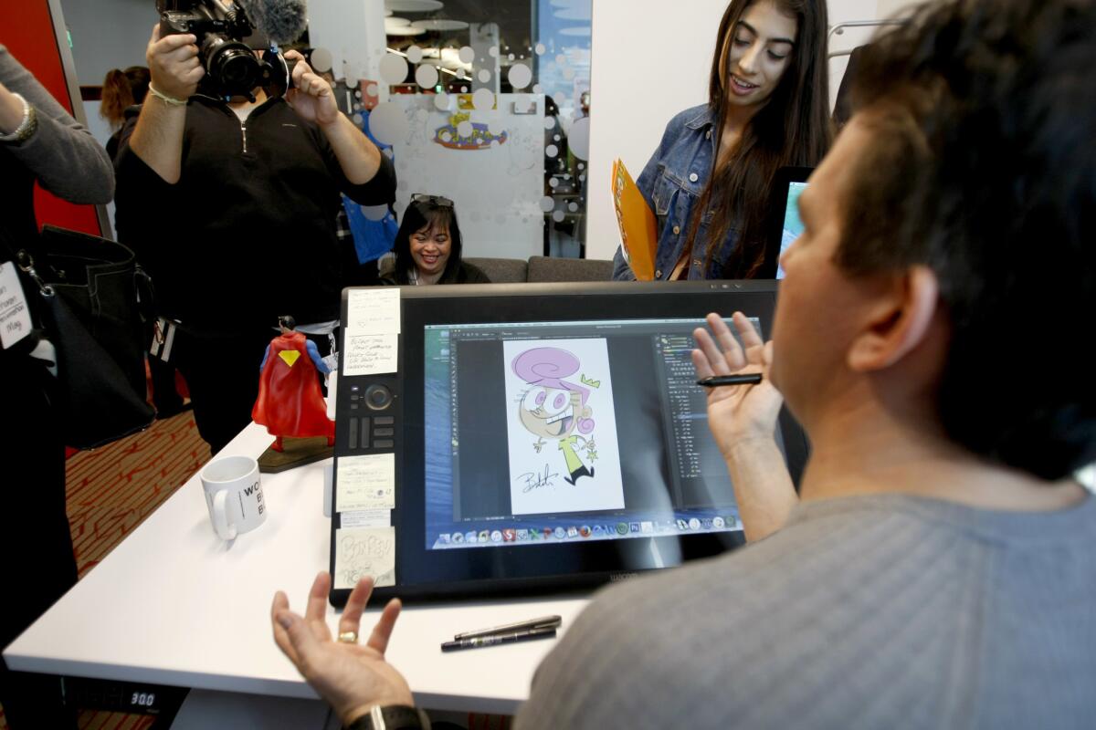Butch Hartman, creator and executive producer of "The Fairly OddParents," talks to the media during ribbon-cutting ceremony for Nickelodeon's new state-of-the-cart campus in Burbank.
