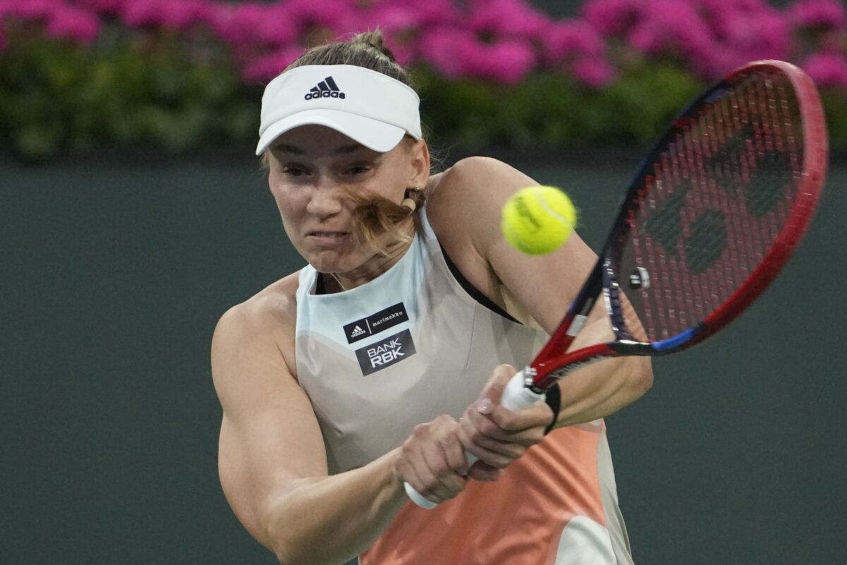 Elena Rybakina returns a shot during her BNP Paribas Open semifinal victory over Iga Swiatek.