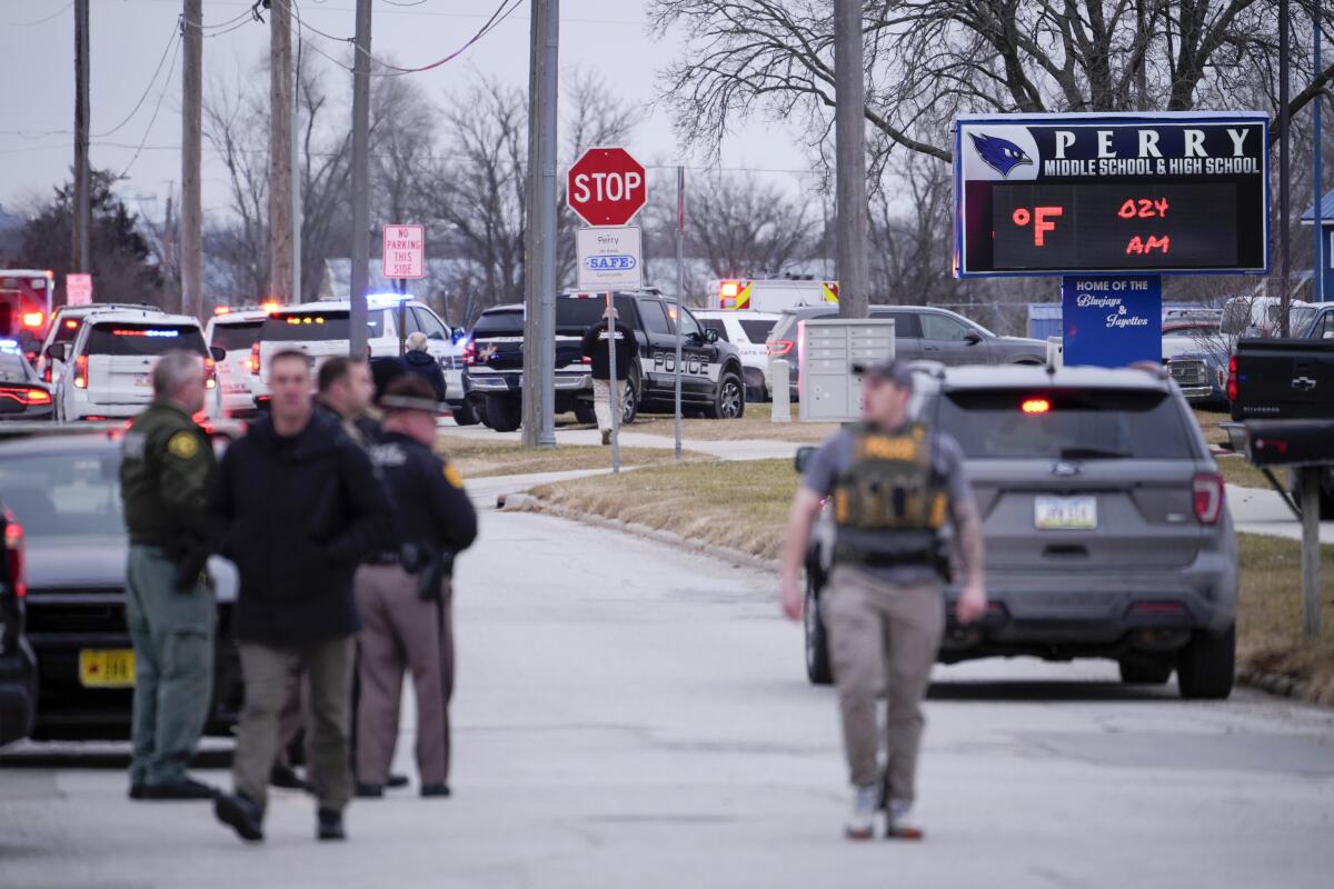 Police respond to a shooting at Perry Middle School and High School in Perry, Iowa, on Jan. 4. 