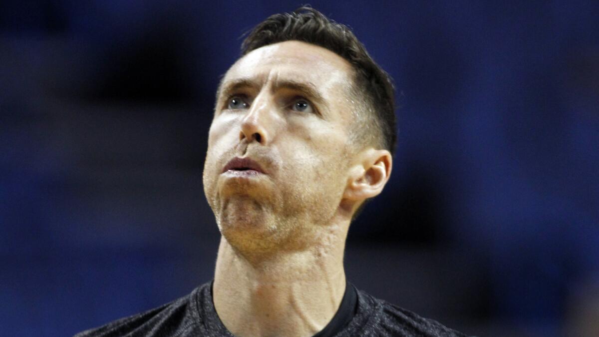 Lakers guard Steve Nash warms up before an exhibition game against the Golden State Warriors on Oct. 12.