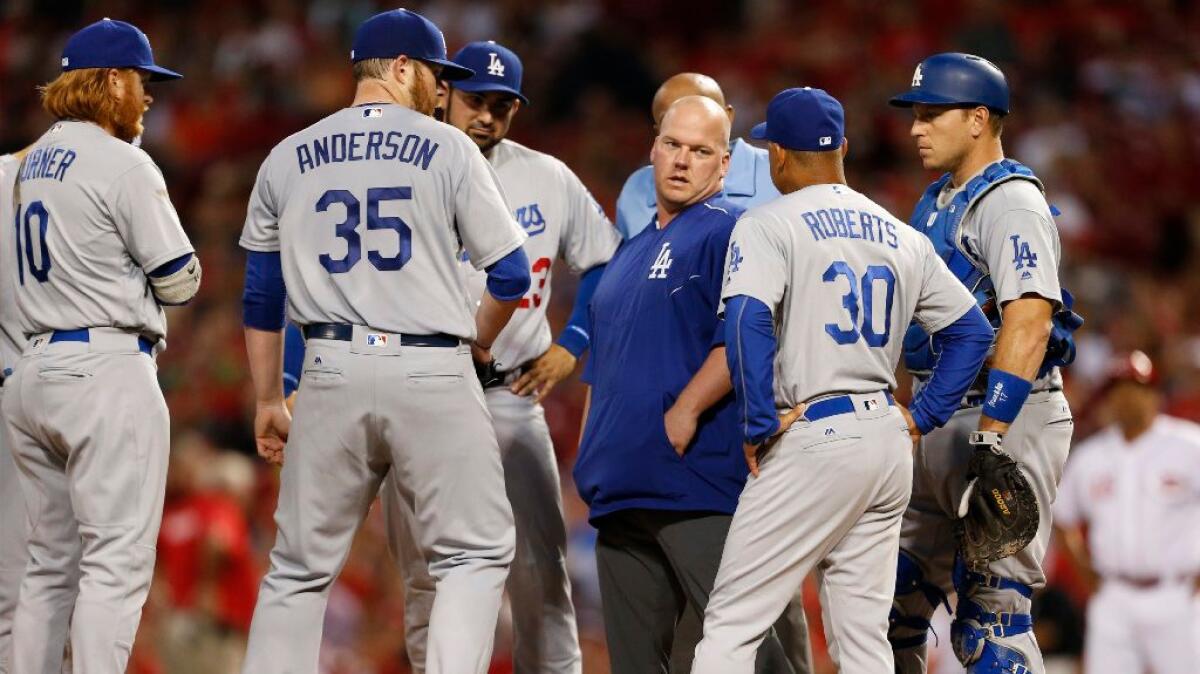 Dodgers pitcher Brett Anderson is pulled from a game against the Reds in the fourth inning on Aug. 20.