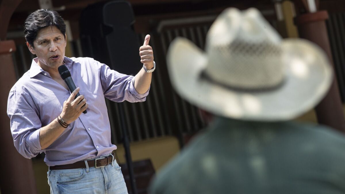 U.S. Senate candidate Kevin de León speaks to farmers at a barbecue in Ventura County on July 28.