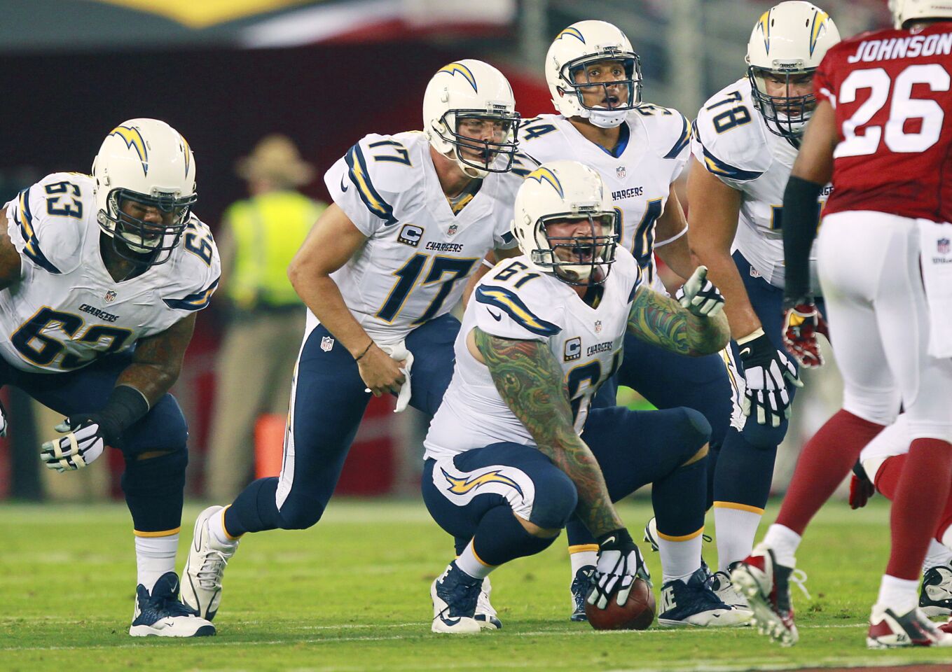 Chargers Philip Rivers calls a play against the Cardinals in Glendale on Sept. 8, 2014.