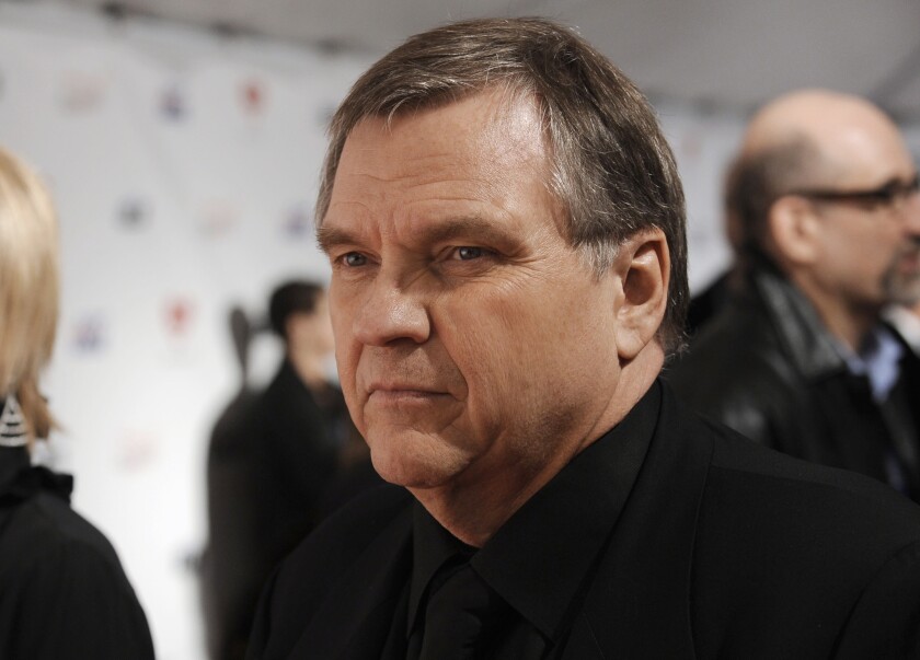 FILE - In this Feb. 6, 2009, file photo, singer Michael Lee Aday, who goes by the stage name Meat Loaf, arrives at the MusiCares Person of the Year tribute honoring Neil Diamond in Los Angeles. Meat Loaf has filed a lawsuit against a hotel at Dallas-Fort Worth International Airport and organizers of a horror convention held there, blaming them for negligence when he fell from a stage while answering questions from convention goers last May. He and his wife Deborah Lee Gillespie Aday filed the suit Monday, Jan. 13, 2020, in a state district court in Fort Worth, Texas, against the Hyatt Corp. and Texas Frightmare Weekend LLC. (AP Photo/Chris Pizzello, File)