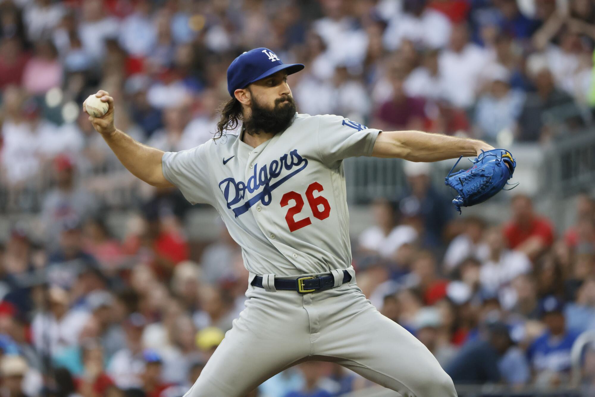 Los Angeles Dodgers starting pitcher Tony Gonsolin throws to an Atlanta Braves batter.