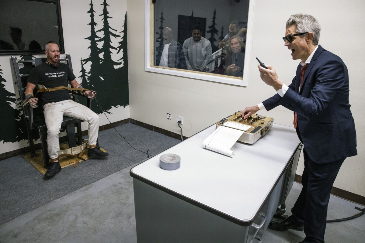 This image released by Paramount Pictures shows Danger Ehren, left, and Johnny Knoxville in a scene from "Jackass Forever." (Sean Cliver/Paramount Pictures via AP)