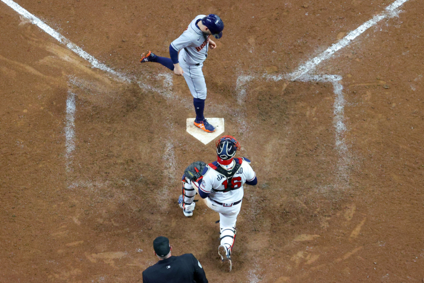 ATLANTA, GEORGIA - OCTOBER 31: Jose Altuve #27 of the Houston Astros reacts after scoring a run.