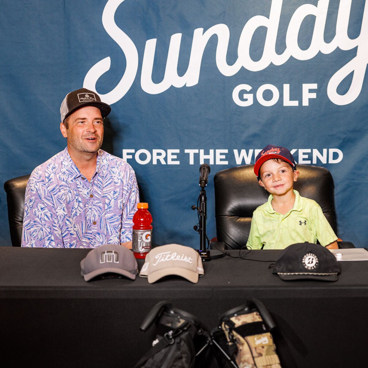 Patton Green and his dad Matt at the signing with Sunday Golf.