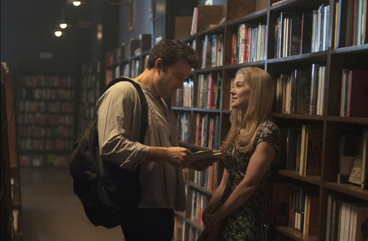 Ben Affleck as Nick and Rosamund Pike as Amy in "Gone Girl."