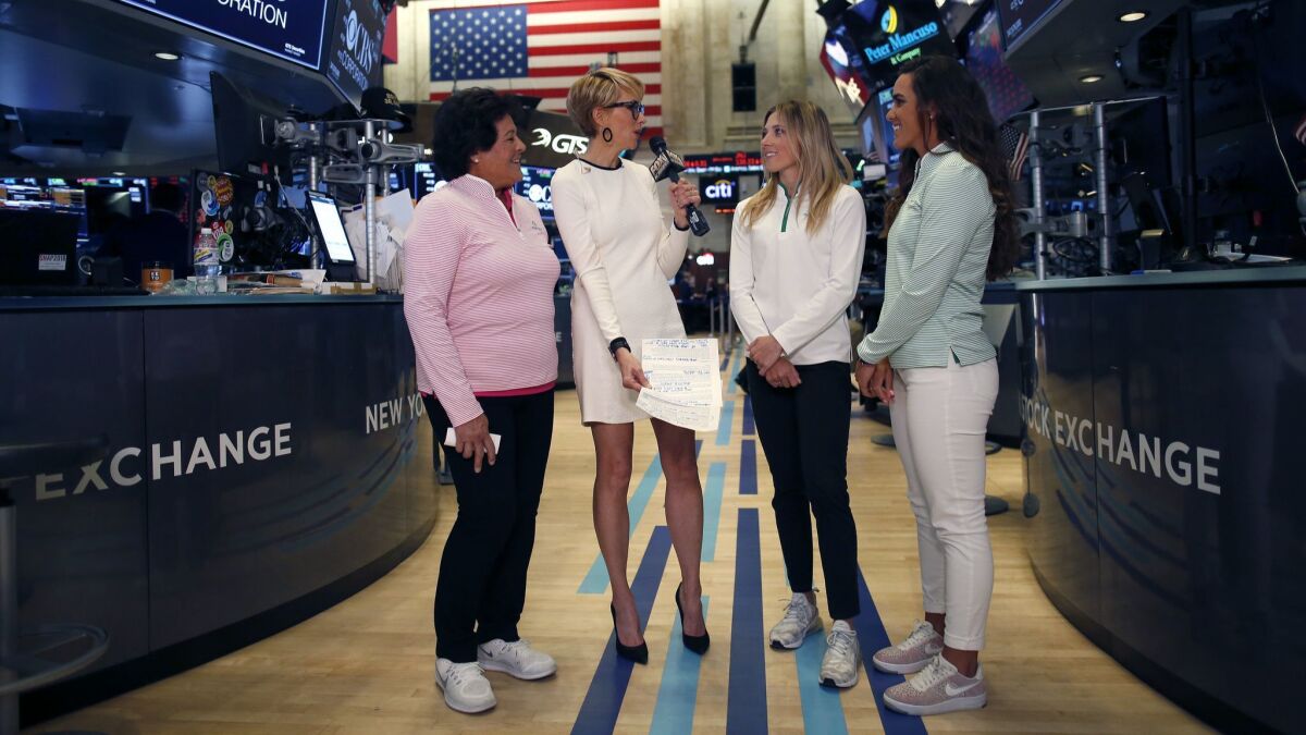Nancy Lopez, Gerri Willis, Sierra Brooks and Maria Fassi during an interview at the New York Stock Exchange for the Augusta National Women's Amateur press tour on March 27 in New York.
