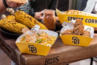 San Diego, CA - March 28: Mexican street corn and stuffed jalapenos are some of the new food items available for the 2023 Padres season at Petco Park in San Diego, CA on Tuesday, March 28, 2023. (Adriana Heldiz / The San Diego Union-Tribune)