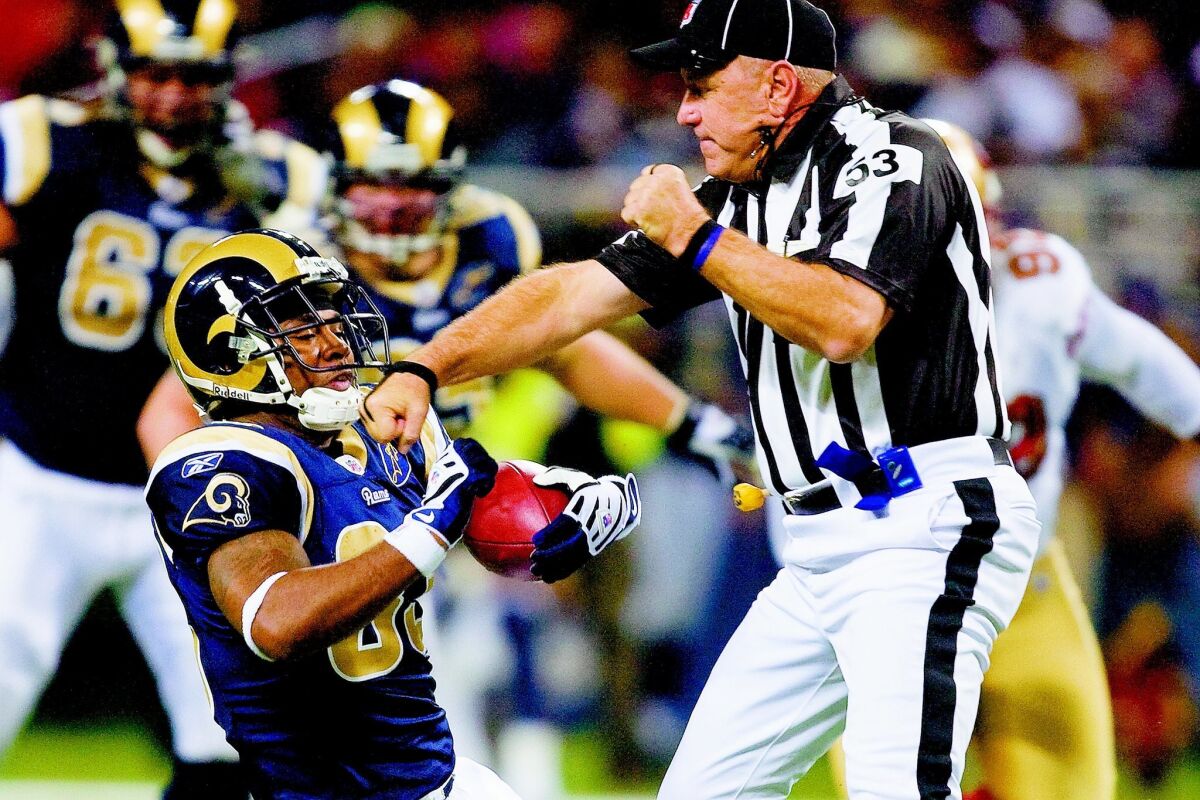 In a well-known play from 2008, umpire Garth DeFelice appears to punch Kenneth Darby of the Rams. DeFelice, who stuck out his forearm to protect himself, said, “If I punched him, I would have been fired.”
