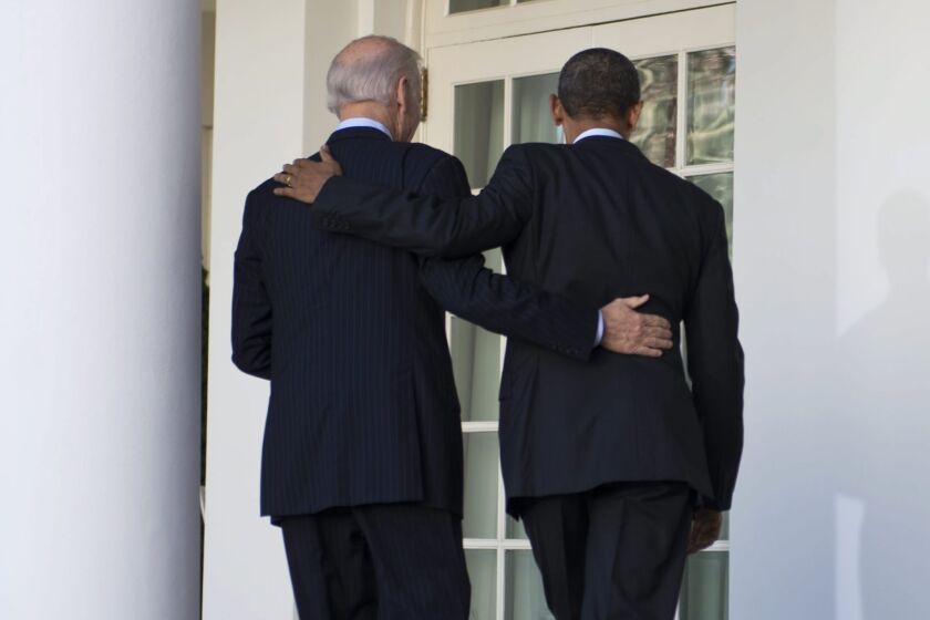 President Obama and Vice President Joe Biden after speaking to reporters about the Affordable Care Act.