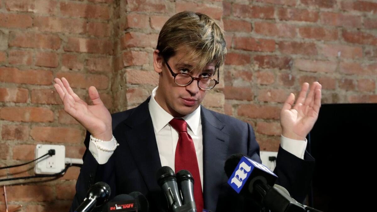 Breitbart senior editor Milo Yiannopoulos addresses the media at a press conference in New York City on February 21.