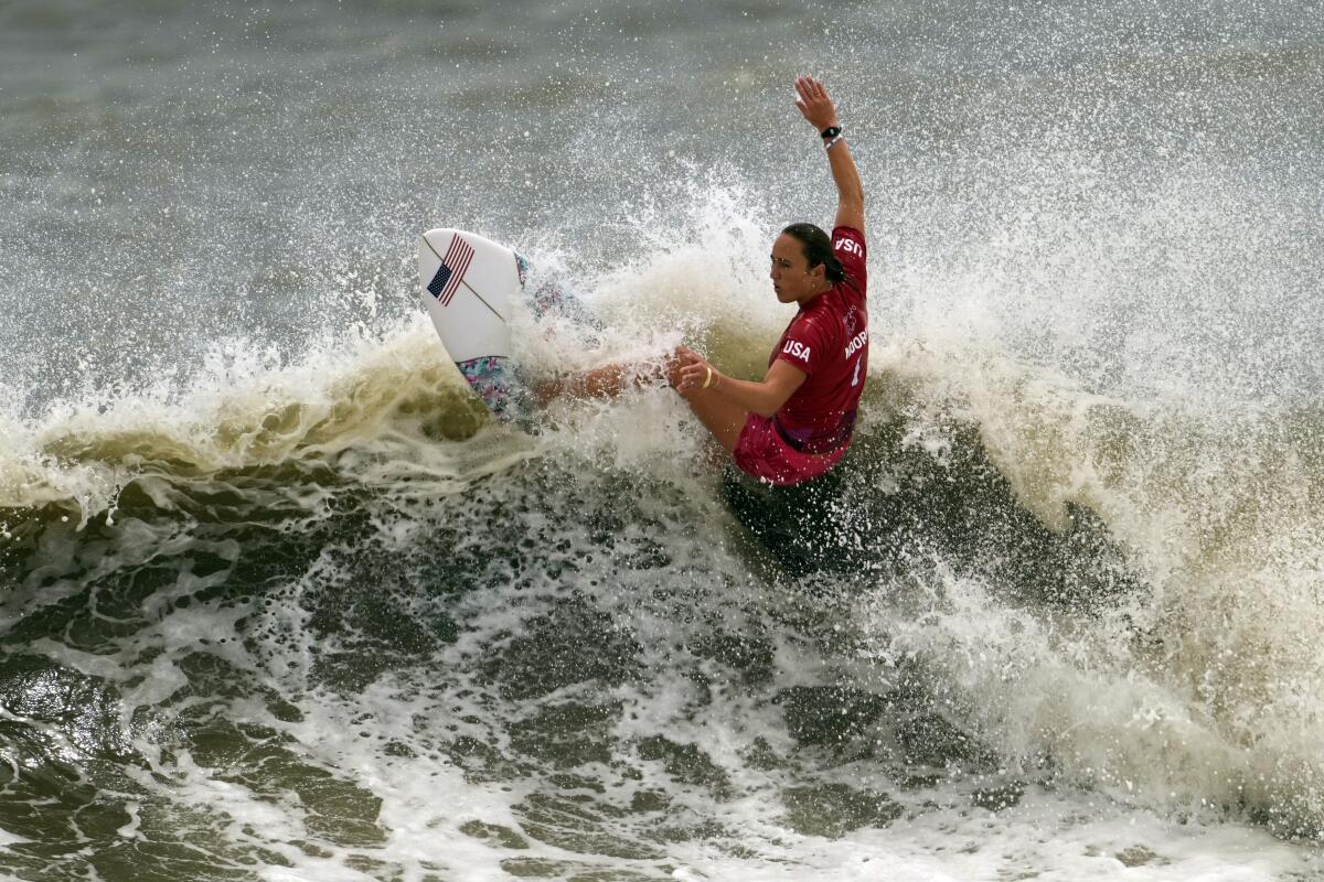 U.S. surfer Carissa Moore rides a wave during the women's surfing competition.
