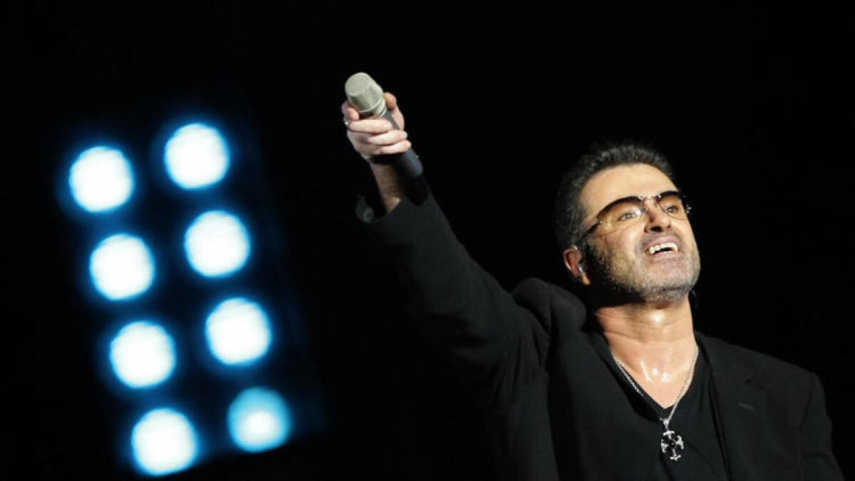 George Michael performs in Abu Dhabi in 2008.