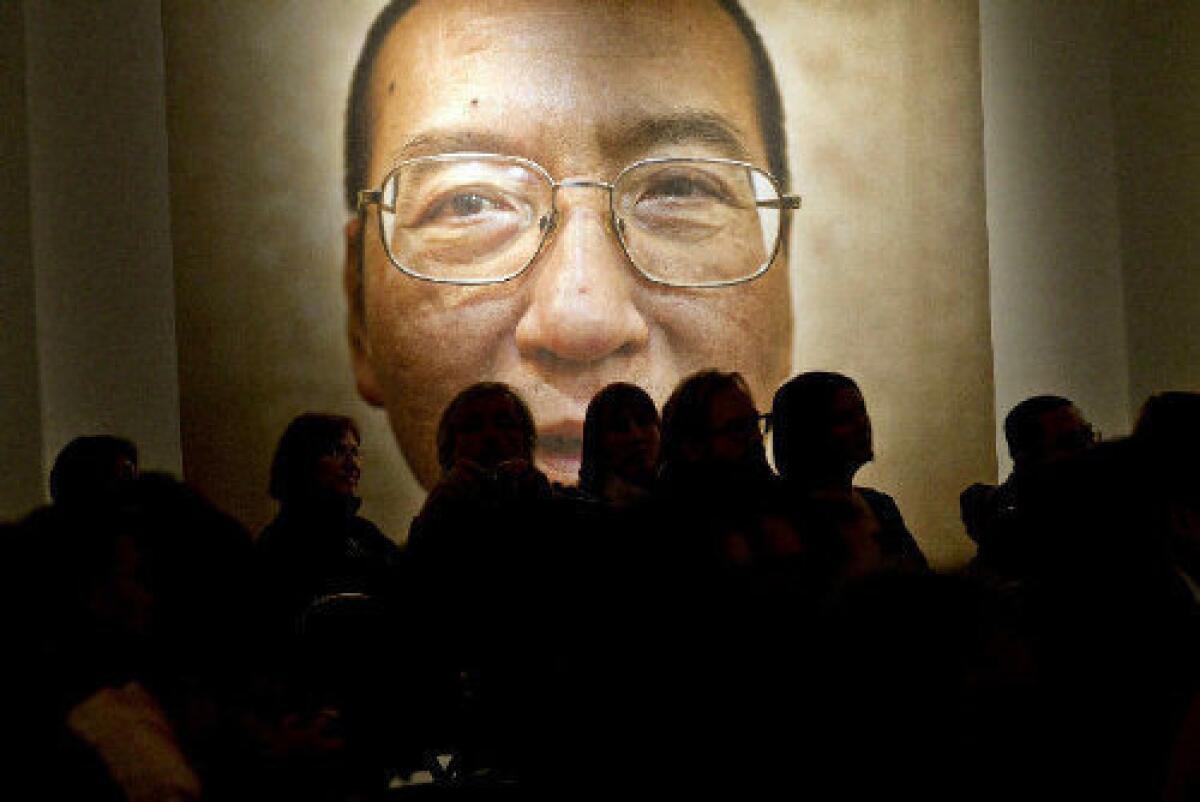 A picture of Liu Xiaobo is seen inside the Nobel Peace Center on the day of The Nobel Peace Prize ceremony in Oslo, Norway.