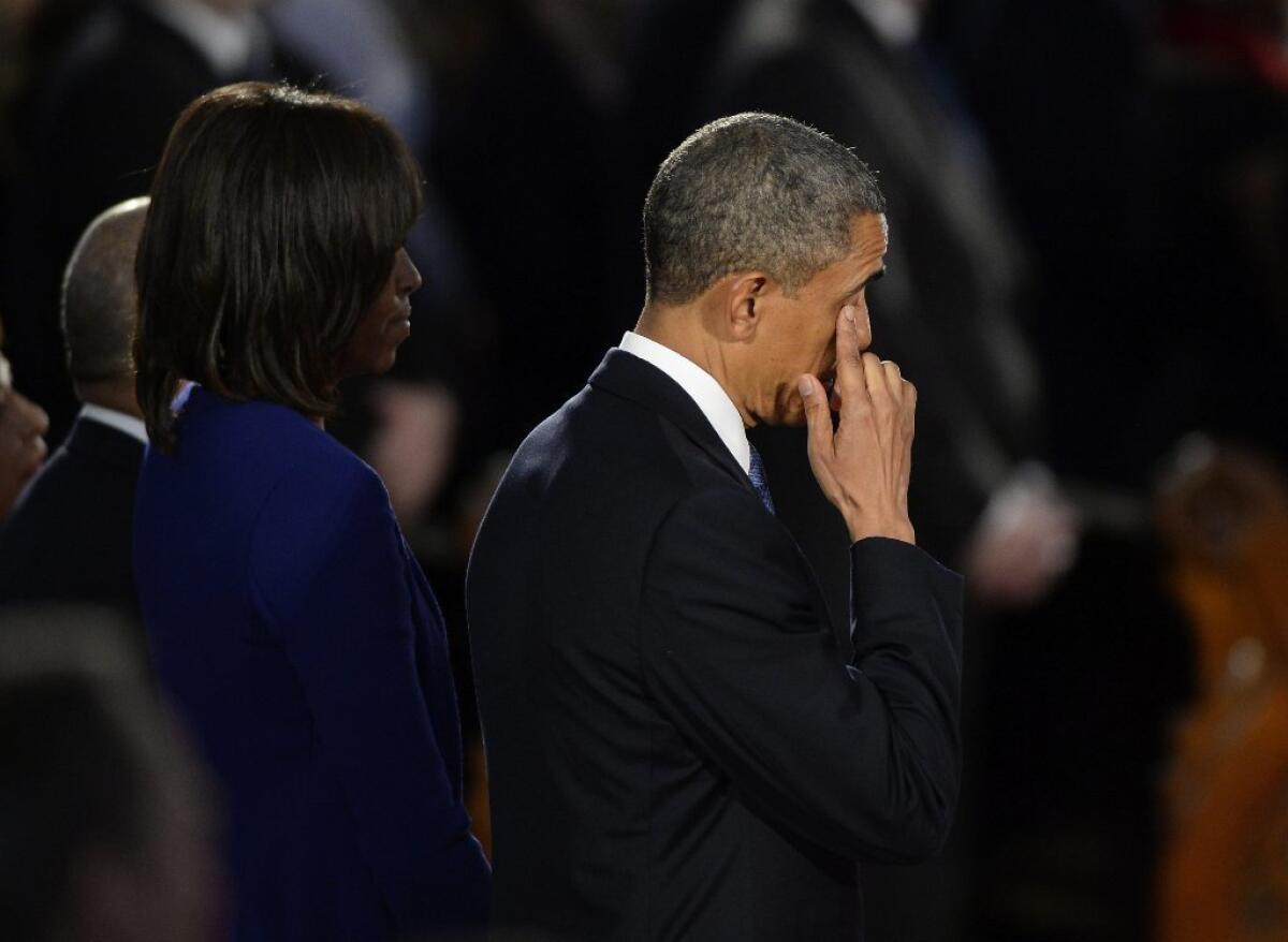 President Obama wipes his eye after addressing an interfaith service last April for victims of the Boston Marathon bombings.