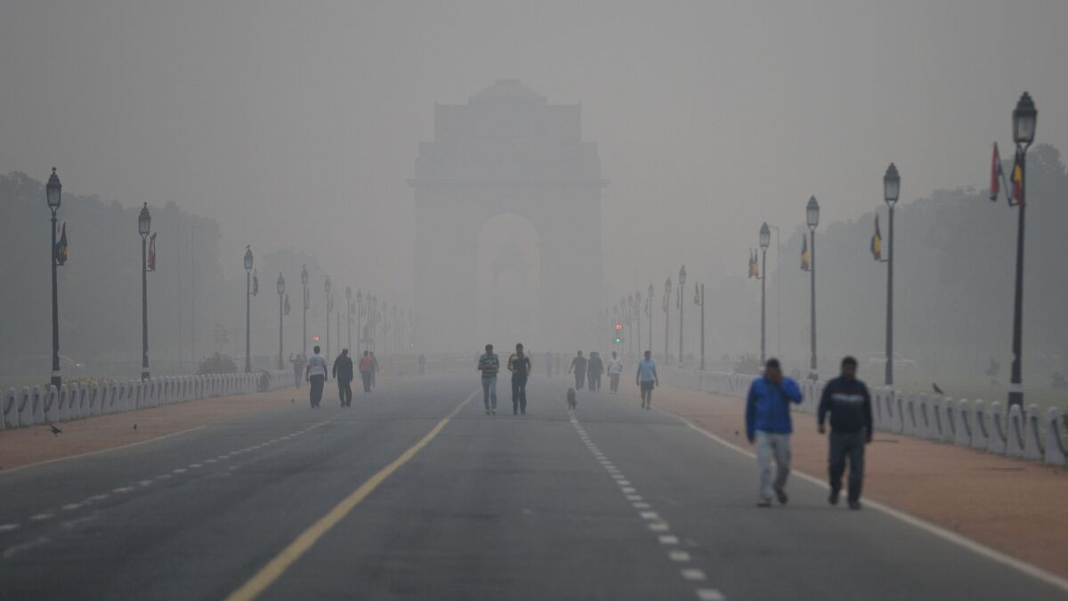 Smog obscures India Gate, a war memorial in New Delhi.