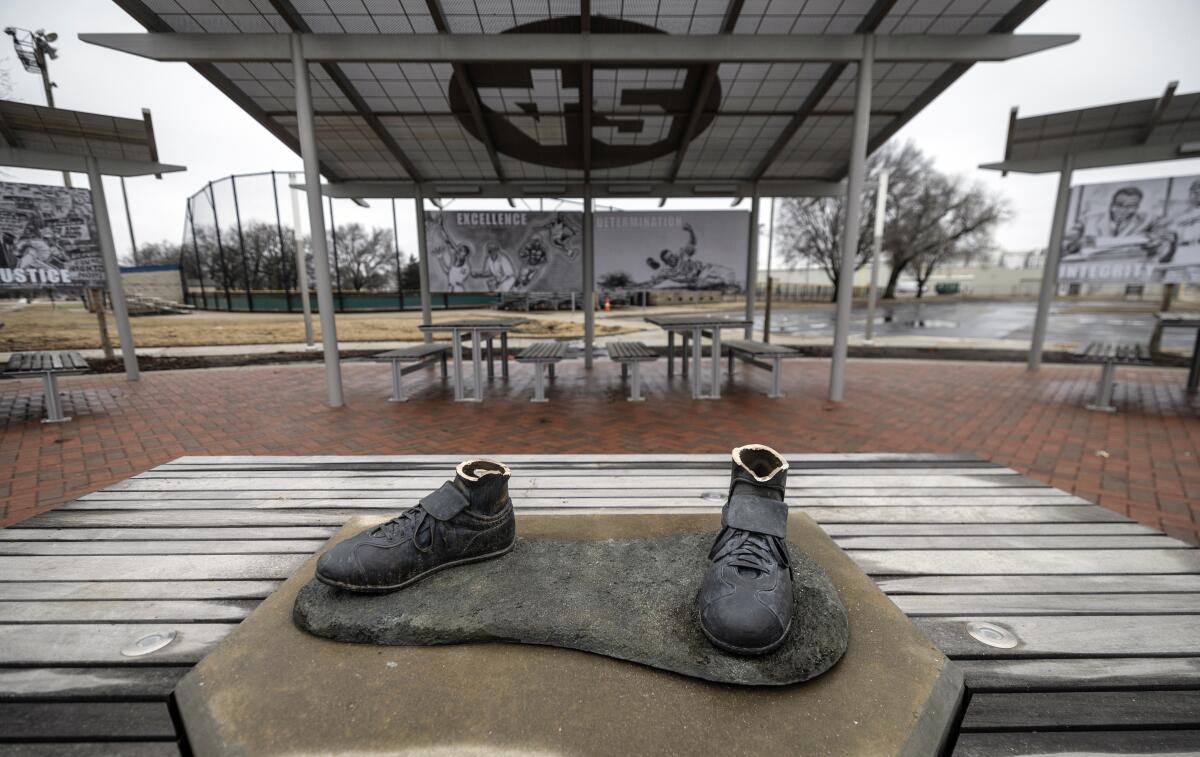 All that remains of a bronze statue of Jackie Robinson in a Wichita, Kansas, park is his shoes.