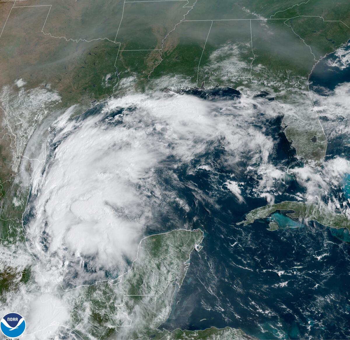 A satellite image showing Tropical Storm Nicholas swirling in the Gulf of Mexico.