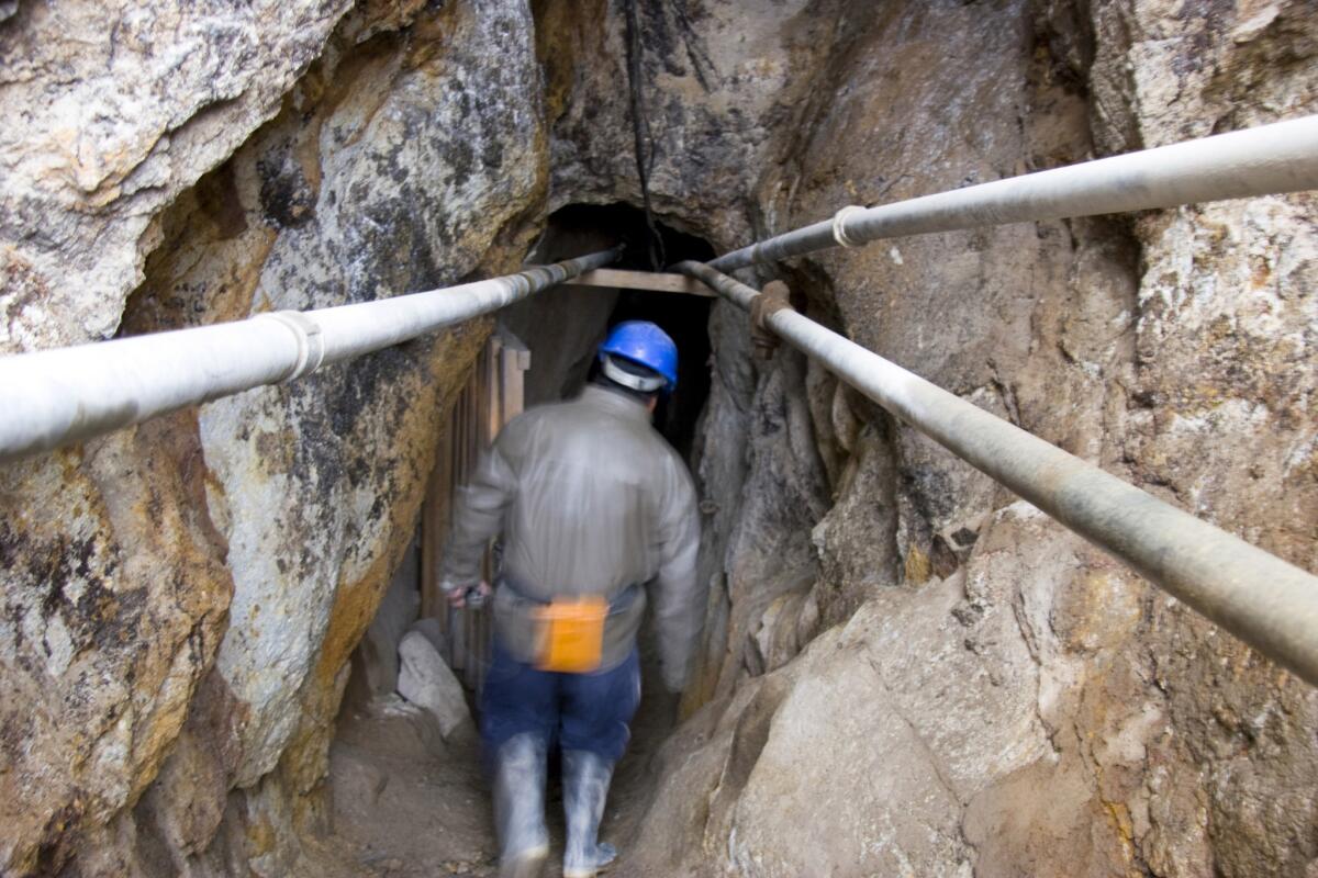 A miner enters the silver-laden Cerro Rico in Potosi.