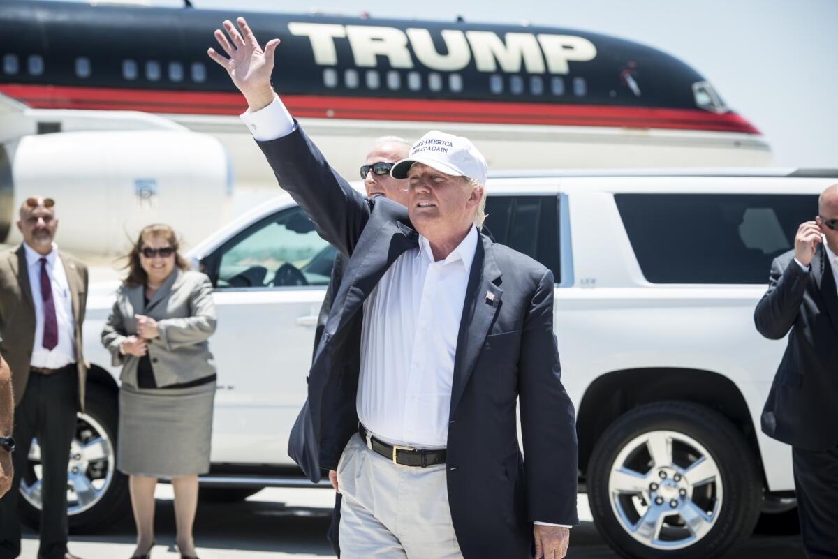 Donald Trump exits his plane during a trip to Laredo, Texas, on the U.S.-Mexico border, on July 23.