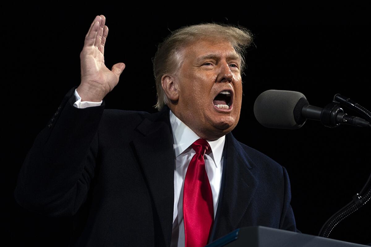 President Trump speaks at a rally in Valdosta, Ga., on Dec. 5 for two Senate GOP candidates.