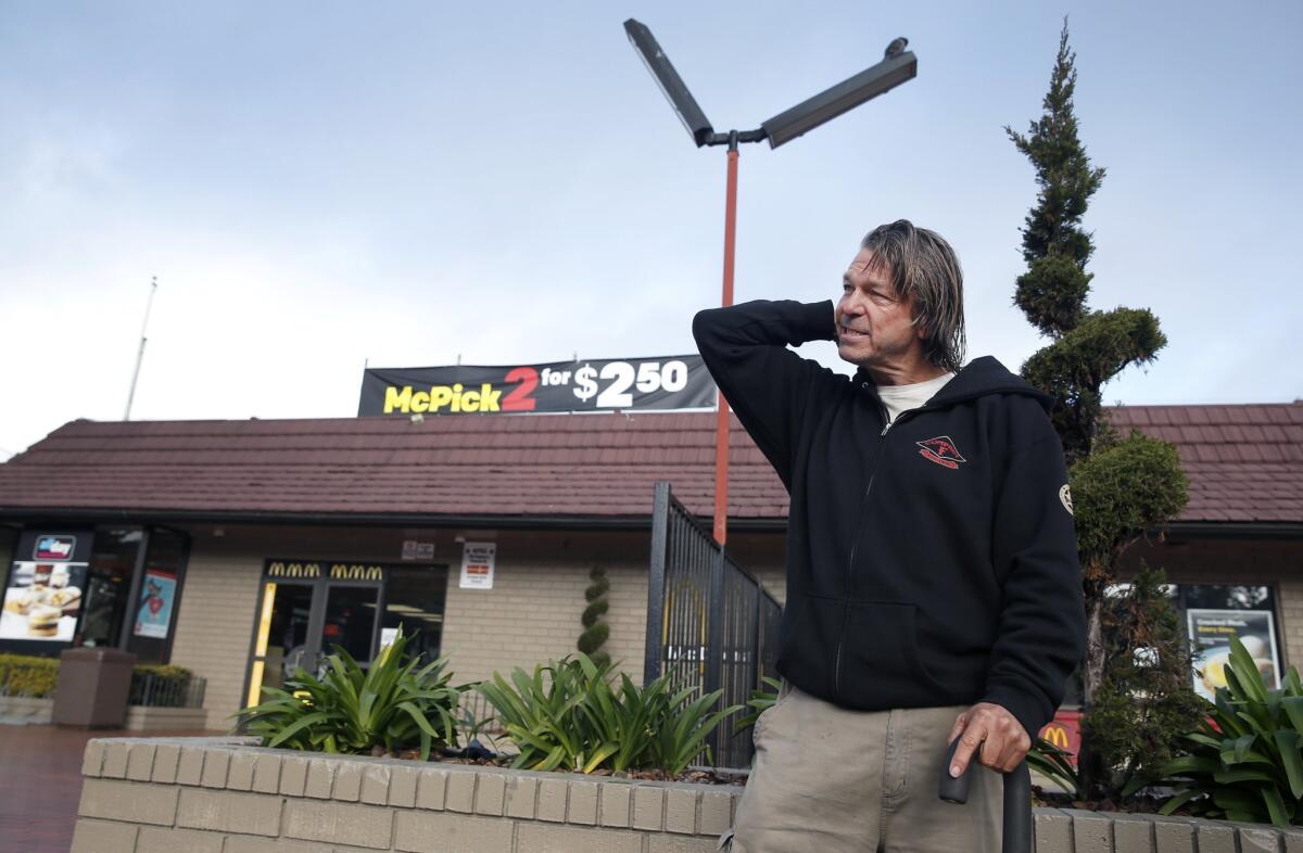 Matthew Hay-Chapman returns to the corner of Haight and Stanyan streets in San Francisco on Feb. 2 to describe how he spotted two Orange County jail escapees.